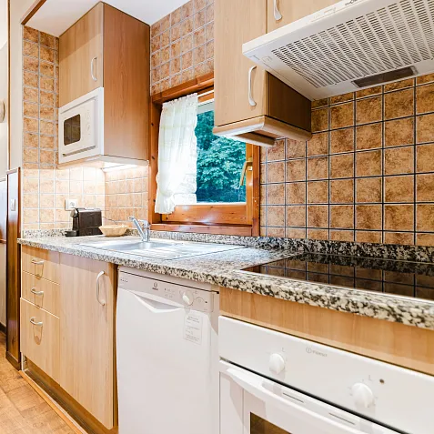 Apartament rústic vistes jardí